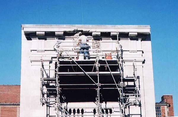 Crew Worker Cleaning the Masonry