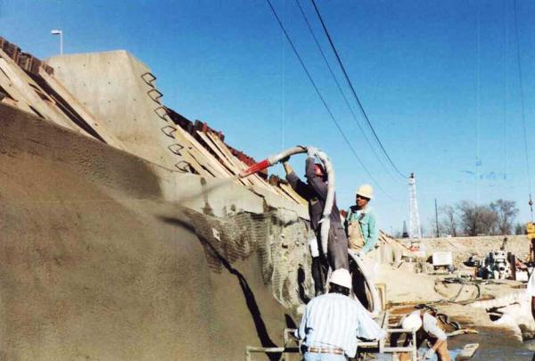 Crew Spraying Dry Process Gunite