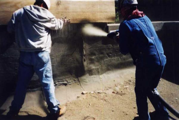 Crew spraying Dry Process Gunite