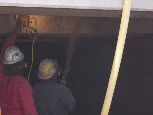 Crew workers using Dry Process Gunite