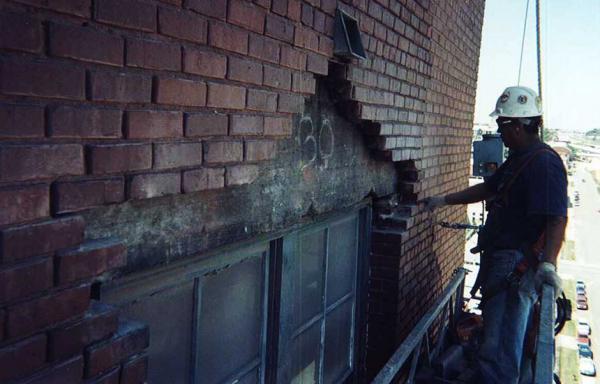 Brick Mason Repairing Thru Wall Flashing