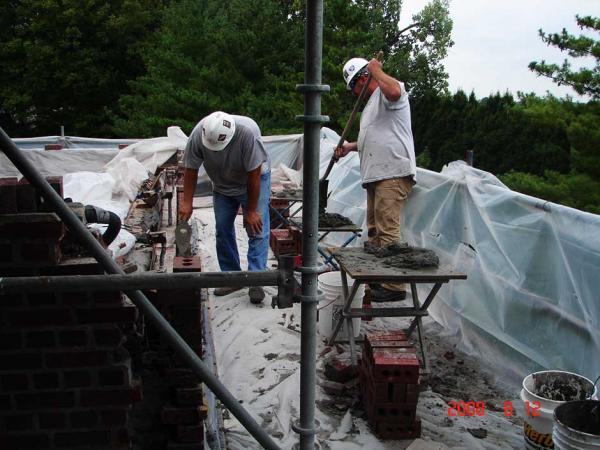 Crew Working on Masonry Restoration Project