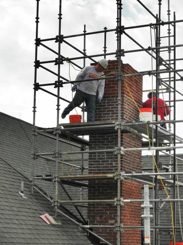 Crew Working on a Chimney