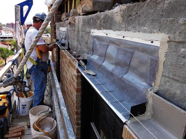 Crew Member Installing Thru Wall Flashing